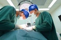 Two veterinarian doctor working in operating room