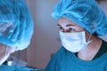 Two veterinarian surgeons in operating room Royalty Free Stock Photo