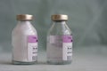 Two vials of antibiotics, in the one is powder, in the second is diluted solution., injection drugs used in treatment of