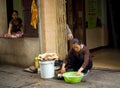 Two Vietnamese women selling meat in Old Quarter of Hanoi, Vietnam