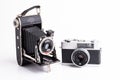 Two vintage analog cameras from different eras