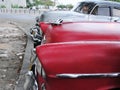 Two 1950s Vintage Cars Parked