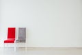 Two vintage chairs in an empty white room Royalty Free Stock Photo