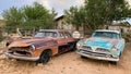 Two vintage DeSoto cars in poor condition and abandoned at Hackberry General Store