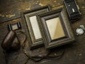 Two vintage frames over a wood background Royalty Free Stock Photo