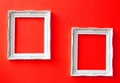 Two vintage frames on red wall Royalty Free Stock Photo