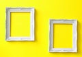Two vintage frames on yellow wall Royalty Free Stock Photo