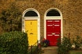 Two vintage Georgian doors yellow and red colors in Dublin, Irela Royalty Free Stock Photo