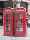 Two Vintage Red Phone Call Boxes in Central London Royalty Free Stock Photo