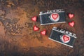 Two retro camera and hearts Royalty Free Stock Photo