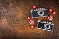 Two retro camera and hearts Royalty Free Stock Photo