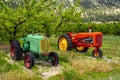 Two vintage tractors side by side