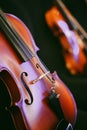 Two violins on some chairs Royalty Free Stock Photo