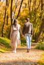 Two walking lovers having romantic date at forest Royalty Free Stock Photo