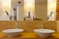 Two washbowls in modern bathroom