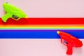 Two water gun with colorful cutting paper for Songkran festival