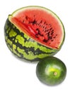 Two water melons on a white background, big and small, dwarfish version Royalty Free Stock Photo