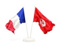 Two waving flags of France and tunisia
