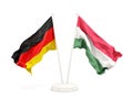 Two waving flags of Germany and hungary isolated on white