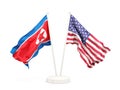 Two waving flags of North Korea and USA Royalty Free Stock Photo