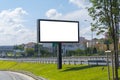 Between two ways billboard canvas mockup in city and blue sky background. Beautiful weather Royalty Free Stock Photo