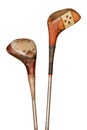 Two weathered ancient golf clubs Royalty Free Stock Photo