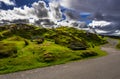 Two Weathered Wooden Benches Beneath The Street In The Village Of Drumbeg In Scotland Royalty Free Stock Photo