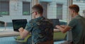 Two Web developers working at the computer inthe modern office. Royalty Free Stock Photo