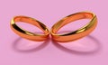 Two wedding gold rings. Unity and love concepts