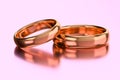 Two wedding golden rings. Unity, love, and romance concept Royalty Free Stock Photo