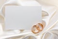 Two wedding rings and card Royalty Free Stock Photo