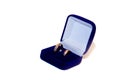 Two wedding rings in double blue box