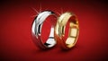 Two Wedding Rings on Red Background Royalty Free Stock Photo