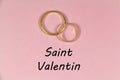 Two wedding rings and Valentine`s day written in french language