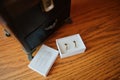 Two wedlock gold rings on white box