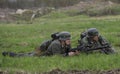 Two Wehrmacht soldiers lying on the grass. Reconstruction of the episode of the great Patriotic war