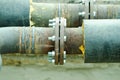 Two welded pipes with bolts and insulation close up Royalty Free Stock Photo