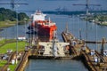 Two westbound container ships transiting the Gatun Locks on the Panama Canal Royalty Free Stock Photo