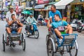 Two Western tourists in Saigon city