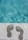 Two wet foot steps by swimming pool Royalty Free Stock Photo