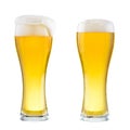 Two wet glasses of fresh cold light beer with foam isolated on w Royalty Free Stock Photo