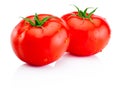 Two wet red tomatoes isolated on white background Royalty Free Stock Photo