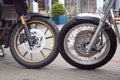 Two wheels of different motorcycles Royalty Free Stock Photo