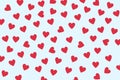 Small red hearts on the blue background. Royalty Free Stock Photo