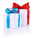 Two White boxs tied with Red and Blue ribbon bow Royalty Free Stock Photo