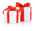 Two White boxs tied with a red satin ribbon bow Royalty Free Stock Photo