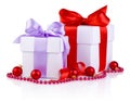 Two White boxs tied with a satin ribbon bow, red Christmas balls Royalty Free Stock Photo