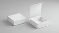 Two white cardboard boxes on a gray surface Royalty Free Stock Photo