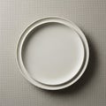 Two white ceramic plates are stacked Royalty Free Stock Photo