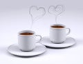 Two white coffee cup with heart smoke